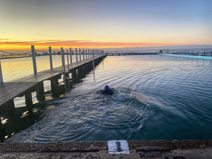 sunrise swimming ocean pool